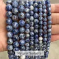 Close-up of natural blue spot stone beads showing unique blue and white patterns - 6mm (Approx 60pcs) / Natural Blue Dot Stone