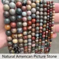 Detailed macro view of natural American Picture Jasper round loose beads for DIY jewelry - 6mm (Approx 60pcs) / Natural American Picture Jasper