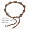 Bohemian vintage camel waist chain belt with circular metal concho and long fringe details. - Camel