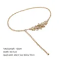 Detailed view of elegant gold chain belt featuring sparkling champagne rhinestone flowers - 105cm/Pack / Gold