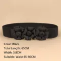 Black elastic waist belt for women featuring three elegant floral fabric ornaments - Black