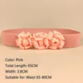 Elegant pink elastic waist belt for women decorated with three handmade fabric flowers - Pink