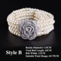Detailed view of four-row elastic pearl belt with sparkling rhinestone flower buckle - B款 65cm