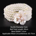 Elegant four-row white pearl elastic belt featuring a vintage rhinestone flower buckle - H款 65cm
