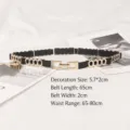 Elegant black elastic waist belt with gold metal link buckle for women's dresses - Ring Hollow-out Interlocking Style (XH785) / 65cmx2cm