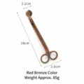 Taglia-stoppino per candele vintage in acciaio inossidabile bronzo rosso - Testa Rotonda Bronzo