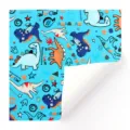 Leuchtend blaues Geschenkpapier mit niedlichen Dinosaurier-Mustern für Bastelarbeiten - Blauer Dinosaurier / 50x70cm