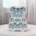 Minimalist Nordic wooden bear LED night light with heart detail for kids bedroom - Blue