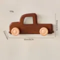 Handcrafted wooden truck-shaped wall hook for children's rooms in dark brown finish - Brown truck hitch
