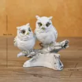 Detailed retro white resin owl figurine pair with golden accents on branch decor - Owl Style D / White