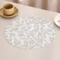 Close-up of circular white PVC placemat with elegant butterfly lace pattern for dining table - F款 (镂空蝴蝶) / Silver