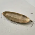 Golden leaf-shaped decorative tray with realistic vein texture for snacks and home decor - Leaf / Gold Brushed Black