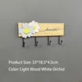 Minimalist solid wood wall coat rack featuring decorative flowers and 4 black hooks - 4 Hooks / Natural Wood with White and Blue Flowers
