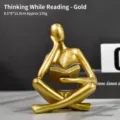 Modern gold abstract thinker sculpture reading book, resin ornament for home decor - Left-Thinking Reading (Gold)