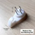 Medium white non-marking nail for picture hanging, 3cm length and 1.2cm width detail. - Medium Non-Trace Nails