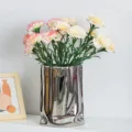 Elegant artificial carnations bouquet in a modern silver rippled vase for home decor - Light Champagne
