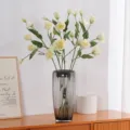 Elegant artificial lisianthus flowers in a grey glass vase for modern home decor - Green