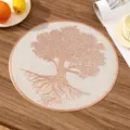 A detailed macro view showing the rose gold Tree of Life design on a white round PVC placemat. - Style I (Tree of Life) / Rose Gold