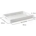 White wooden serving tray with cutout handles and elegant carved pattern for home decor. - Rectangle / White