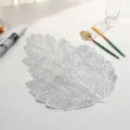 Elegant silver leaf-shaped PVC placemat with intricate hollow-out design for dining table - Style M (Leaf-Shaped Hollow) / Silver