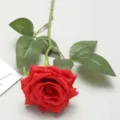 Single stem artificial red rose with curled petals and green leaves for home decor - Red