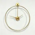 Detailed view of a minimalist gold metal wall clock with a circular frame design - Diameter 50CM / Gold
