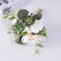 Detail view of elegant artificial wedding bouquet with white roses and eucalyptus leaves - White Ranunculus Hydrangea Bundle / White