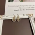 Elegant vintage shell drop earrings encrusted with rhinestones and central pearl detail - Shell Pearl Rhinestone Style (E0138)