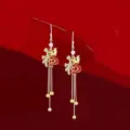 Long golden tassel earrings featuring Chinese Fu character and red dragon design - Fu Character Zodiac Dragon Tassel Earrings (E3730) / Red/Gold
