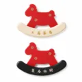 Red rocking horse shaped bag hanger organizer with cream and black base variants - White