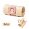 Durable beige donut-shaped quilt and bed sheet fixer clip for secure bedding sheets - Single Piece / Yellow