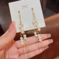Elegant long gold tassel earrings with cascading white pearls and S925 silver posts - White Pearl Tassel Style (E0236) / Gold+White