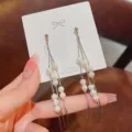 Elegant silver dangle earrings with multiple white pearls for women - White Pearl Tassel Style (E0236) / Silver & White
