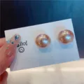 High-luster oversized champagne gold pearl stud earrings shown on white display card - Champagne Large Artificial Pearl Stud Earrings (E3025) / Champagne
