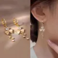 Elegant gold tassel earrings featuring white floral petals and sparkling heart-shaped crystals - Petal Heart Rhinestone Tassel Earrings (E3033) / Gold