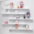 Modern white 5-tier staggered wall shelf for displaying action figures and collectibles - White (5 Tiers)