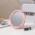 Cute pink round desktop makeup mirror with wavy frame for student dormitory vanity - Spiral Textured Oval Style (Pink)