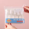 Complete 7-piece travel toiletry bottle set including spray and pump bottles in clear pouch - 7+2 Set (9-Piece) / White