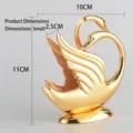 Elegant gold swan napkin holder in zinc alloy, small size with clear dimension markings - 10x11x2.5cm / S