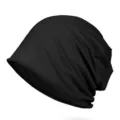 Unisex classic solid black cotton slouchy beanie hat featuring a stylish rolled edge - Fits 56-60cm Head Circumference (Elastic) / Black