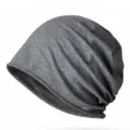 High-quality soft dark grey slouchy beanie hat featuring a rolled edge and textured knit finish - Fits 56-60cm Head Circumference (Elastic) / Dark Heather Gray