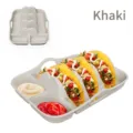 Premium khaki silicone taco holder tray with three built-in slots and sauce dividers. - Khaki