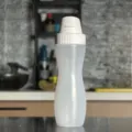 Botella de salsa de PP translúcido con tapa abatible blanca para condimentos de cocina - Agujero Único / 230ml / Blanco