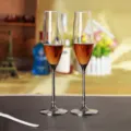 Pair of elegant crystal champagne glasses with silver metal stems for wedding gift sets. - 2-Piece Set / Silver