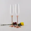 Set of 2 elegant champagne flutes with rose gold metal bases and stems for wedding gifts - 2-Piece Set / Rose Gold