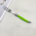 Stainless steel dinner fork with vibrant green handle, elegant western tableware SKU. - Green