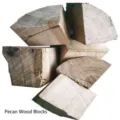 Close-up detail of natural hickory wood chunks for professional BBQ meat smoking - Hickory Wood Chunks