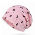 Berretto slouchy traspirante in pizzo rosa per donna con stampa a fiocchi neri - Taglia unica / Modello a fiocco / Rosa