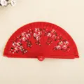 Eleganter roter spanischer Faltfächer mit handbemalten weißen Blumenmustern zum Tanzen - Doppelseitig bemalt / Rot