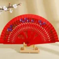 Abanico de madera pintado por ambas caras al estilo español con patrón de delfín - Rojo